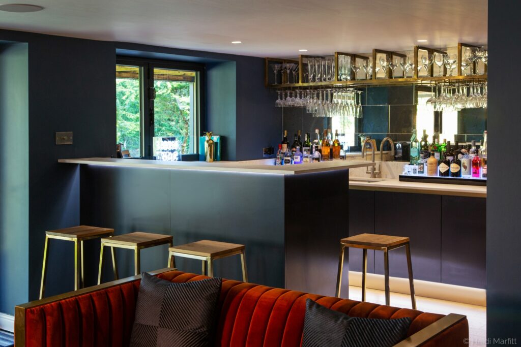 A bespoke bar means this basement is the perfect place to celebrate in style