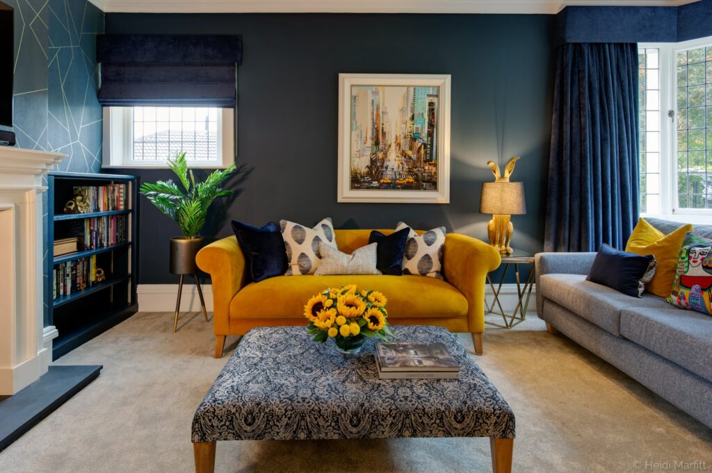 Yellow accents bring this navy sitting room in Yorkshire to life