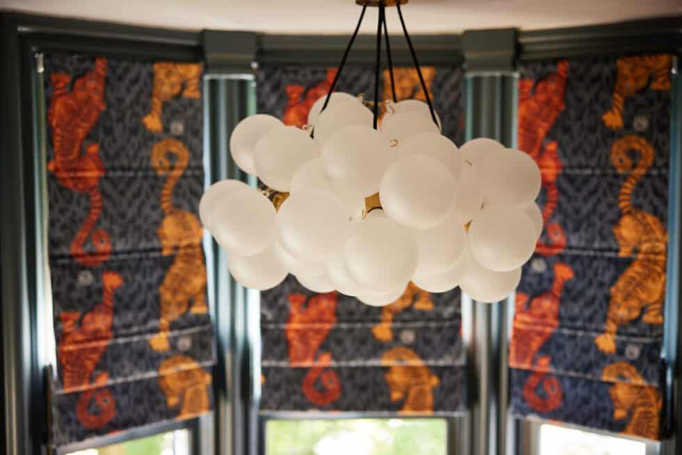 A statement chandelier is a great addition to this hallway